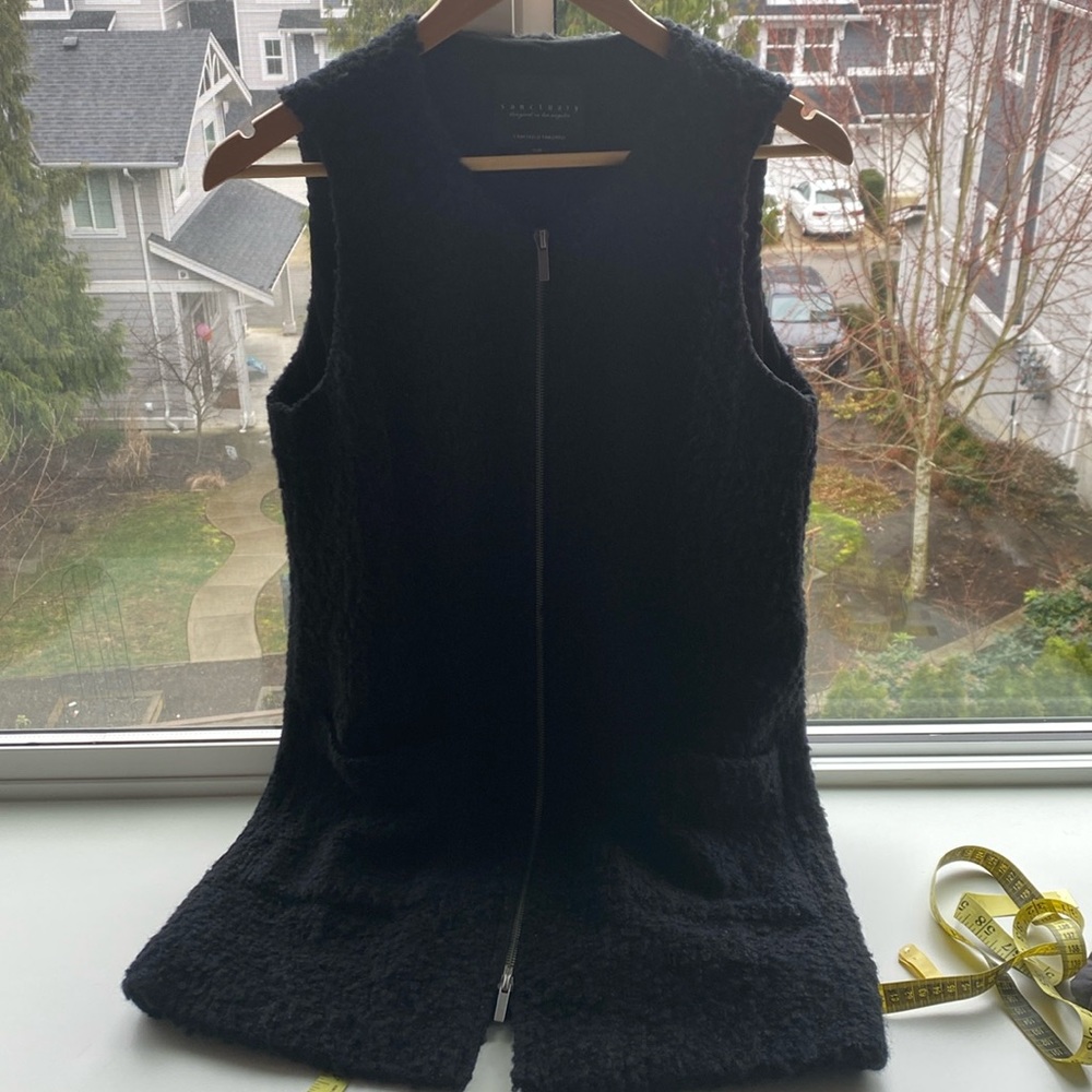 Black sweater vest